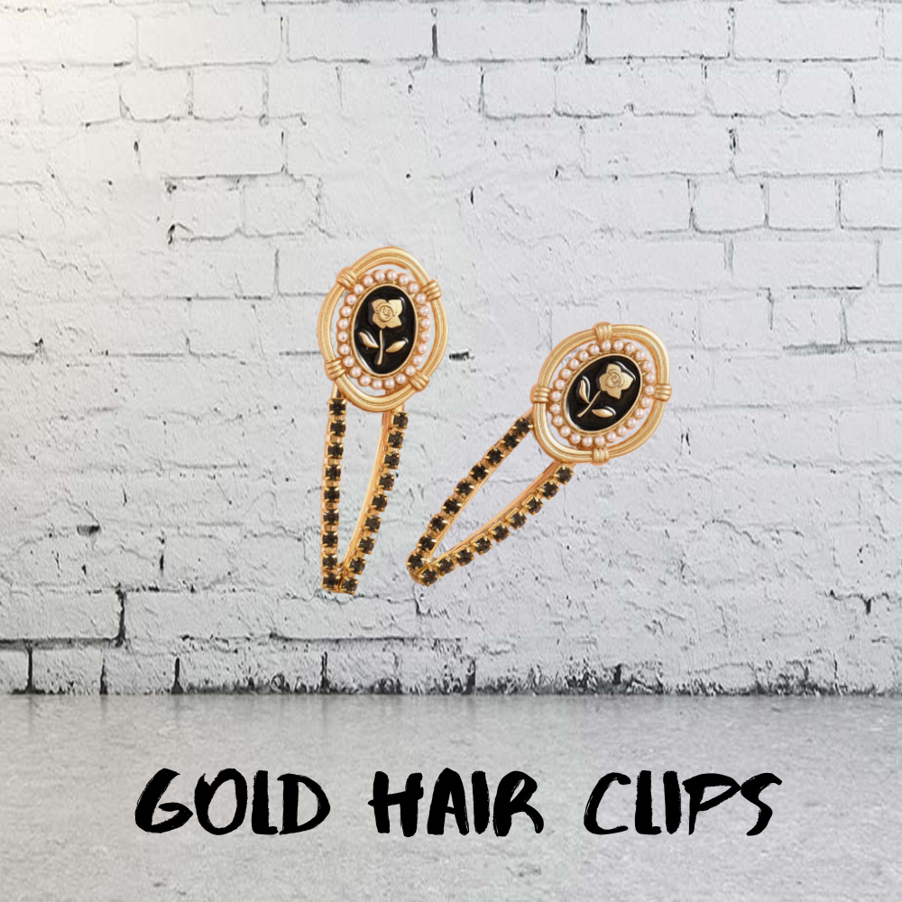VINTAGE BLACK AND GOLD HAIR CLIPS